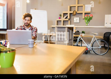 Graphic designer working on laptop Stock Photo