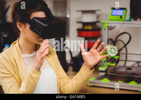 Female graphic designer using the virtual reality headset Stock Photo