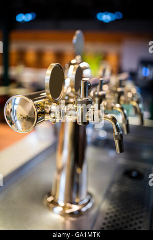 Close-up of beer pump in a row Stock Photo