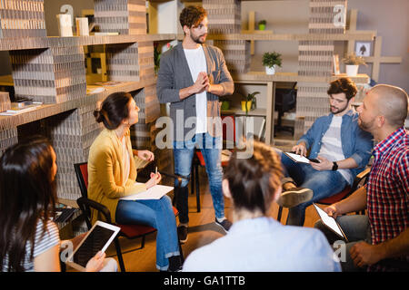 Colleagues having discussion Stock Photo