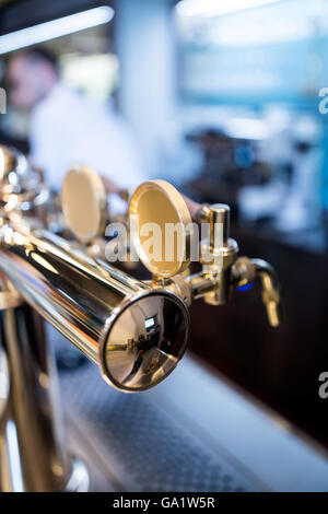 Close-up of beer pump in a row Stock Photo