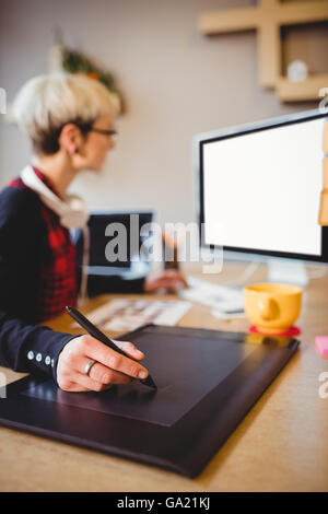 Graphic designer using graphics tablet Stock Photo