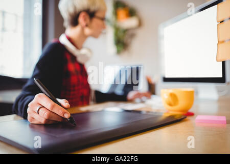 Graphic designer using graphics tablet Stock Photo