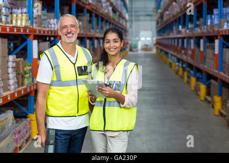 Happy workers are posing and smiling to the camera Stock Photo
