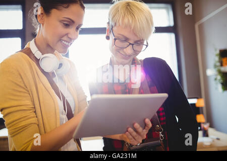 Two female graphics designer using digital tablet Stock Photo