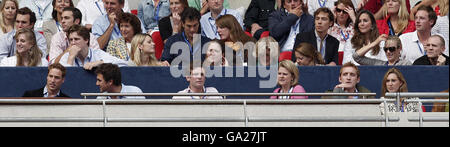 Britain's Prince William (left, front row) sits a little distance away from his former girlfriend Kate Middleton (second left, back row) at Wembley Stadium, north-west London, during today's star-studded pop concert in memory of Diana, Princess of Wales. Stock Photo