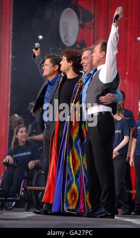 Donny Osmond (left), Jason Donovan (right), Andrew Lloyd Webber (second right) and Lee Mead during the charity concert in memory of Diana, Princess of Wales on what would have been her 46th birthday at Wembley Stadium, London. Stock Photo