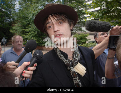 Singer Pete Doherty leaves West London Magistrates Court in London where he faced drugs charges minutes after a warrant was issued for his arrest. Stock Photo