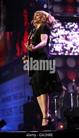 Live Earth Concert - London. Madonna performs during the charity concert at Wembley Stadium, London. Stock Photo