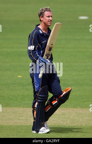 Sussex Sharks' Murray Goodwin celebrates reaching his century during the Friends Provident Trophy Southern Conference match at Lord's, London. Stock Photo