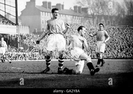 Manchester City's Ray Gill (r) clears from Arsenal's Doug Lishman (l) Stock Photo