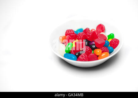 Close up of a bowl of candy, isolated on white Stock Photo