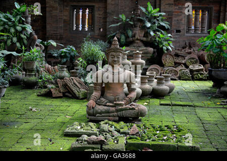 a garden and Buddha terracota of Mr Ban Phor Linag Meuns Terracota Art in the city of chiang mai in the north of Thailand in Sou Stock Photo