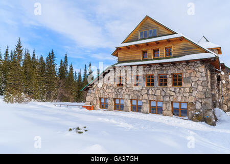 Mountain refuge Murowaniec in winter landscape of Gasienicowa valley, Tatra Mountains, Poland Stock Photo