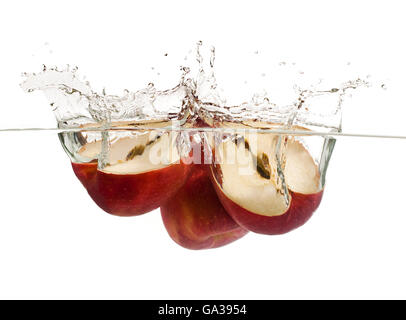 Apple Slices Splash Isolated on White Background Stock Photo