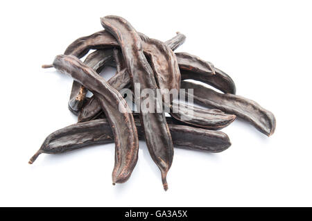 Group of Carob Pods Isolated on White Stock Photo