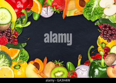 frame out of fruits and vegetables on slate background Stock Photo