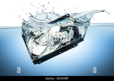 hard disc drive splashes into water Stock Photo