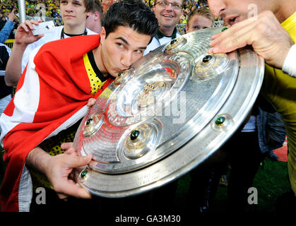 Borussia Dortmund, German soccer champion, cheering, Nuri Sahin and Lucas Barrios with the Champion trophy Stock Photo