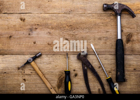 Selection of carpentry tools from above. on a  wooden worktop bench. Stock Photo