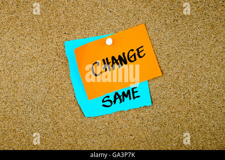 Same Change written on paper notes written on paper notes pinned on cork board with white thumb tack, copy space available Stock Photo