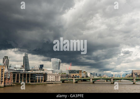 London, United Kingdom - June 25, 2016: London Skyline with moody sky seconds before a storm, with Southwark bridge Stock Photo