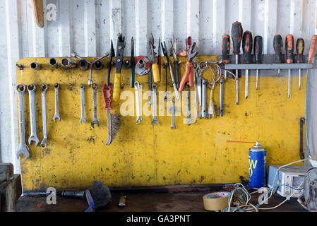 Display of garage work tools on a workbench with nobody Stock Photo