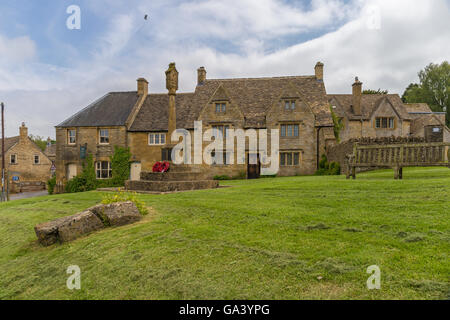 Guiting Power village green and Cross Stock Photo