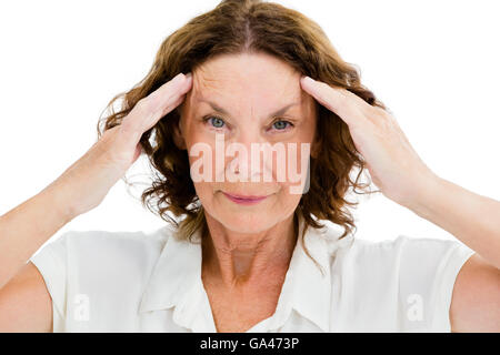 Portrait of unhappy mature woman having headache Stock Photo