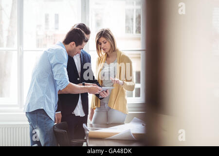 Interior designers using digital tablet Stock Photo