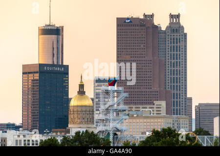 Atlanta, Georgia downtown skyline with the gold-domed Georgia Capitol building and the 1996 Summer Olympic Flame Tower. Stock Photo