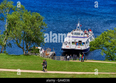 Urquhart Castle sits beside Loch Ness in the Highlands of Scotland Stock Photo