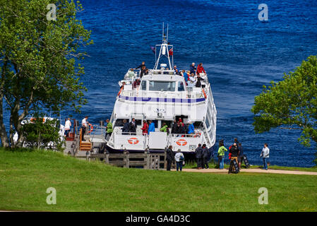 Urquhart Castle sits beside Loch Ness in the Highlands of Scotland Stock Photo