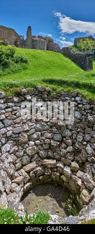 Urquhart Castle sits beside Loch Ness in the Highlands of Scotland Stock Photo
