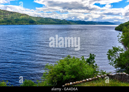 Urquhart Castle sits beside Loch Ness in the Highlands of Scotland Stock Photo