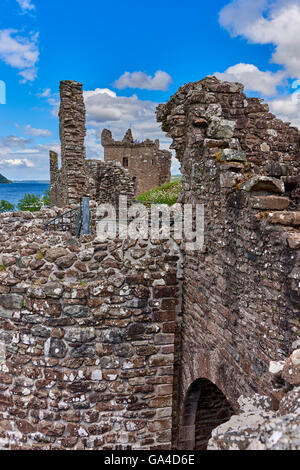 Urquhart Castle sits beside Loch Ness in the Highlands of Scotland Stock Photo