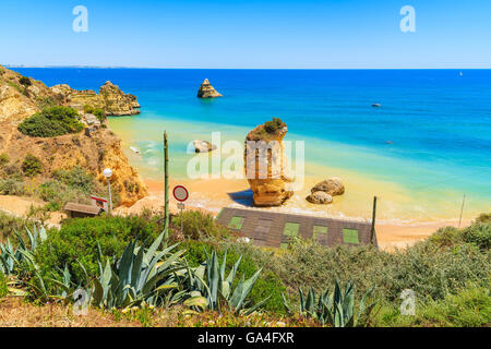 View of famous Praia Dona Ana beach with turquoise sea water and cliffs, Portugal Stock Photo