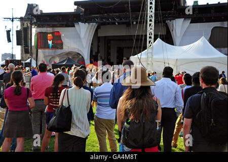 Ottawa, Canada - June 29, 2016:  People gather on Parliament Hill to listen to the speech Barack Obama is giving inside as part of the Three Amigos Summit.  Obama is very popular with Canadians. Stock Photo