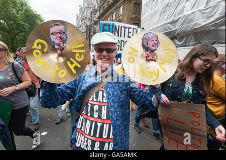 London, UK. 2nd July 2016. A man holds up cymbals with pictures of Gove and May and message 'Gove to Hell' and 'No Way May' on the march by more than 50,000 people through London to a rally in Parliament Square to show their love for the EU and in protest against the lies and deception from both sides of the EU referendum campaign. Many feel that the result did not truly reflect the will of the people and that the majority was too small to be a mandate for such a drastic change. Peter Marshall/Alamy Live News Stock Photo