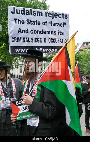 London, UK. 3rd July, 2016. Pro-Palestinian groups took part in a march and rally to commemorate Al-Quds Day. Organized by the Islamic Human Rights Commission the goal was to 'call for an end to racism, anti-semitism and Zionism. The March ended by the US Embassy and was met by an Israeli counter protest. Central London 3.7.16 Credit:  Janine Wiedel Photolibrary/Alamy Live News Stock Photo