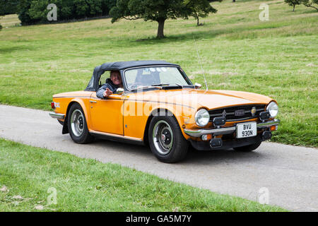 1975 Triumph TR6 at Leighton Hall Classic Car Rally, Carnforth, Lancashire, UK.  3rd July, 2016.  The annual classic car rally takes place at the magnificent Leighton Hall in Carnforth in Lancashire.  British classic sports cars ranging from MG's to American muscle cars like the Dodge Vipers & Ford Mustangs.  The spectator event drew thousands of visitors to this scenic part of the country on the north west coast of England.  Credit:  Cernan Elias/Alamy Live News Stock Photo