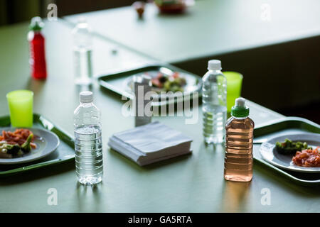 Food with water bottles on table Stock Photo