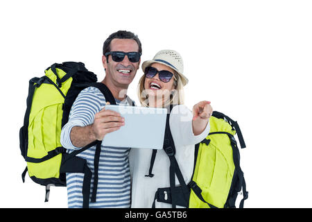 Cheerful couple taking selfie on digital tablet Stock Photo