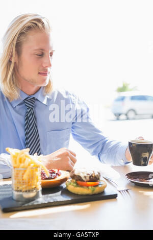 Man having coffee and breakfast Stock Photo