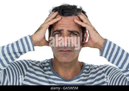 Portrait of man suffering from headach Stock Photo