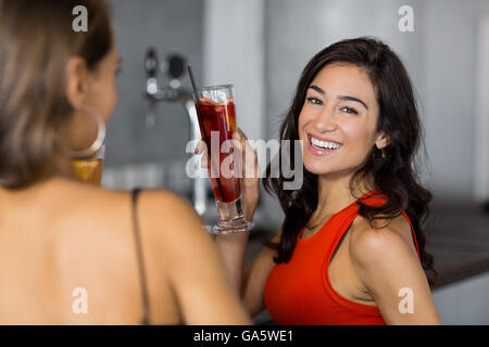 Two women having cocktail Stock Photo