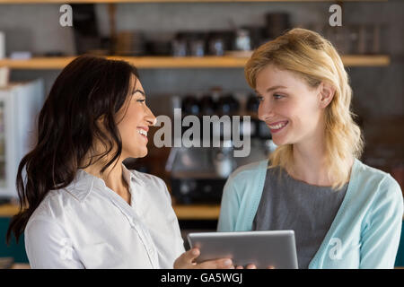 Business colleague using digital tablet Stock Photo