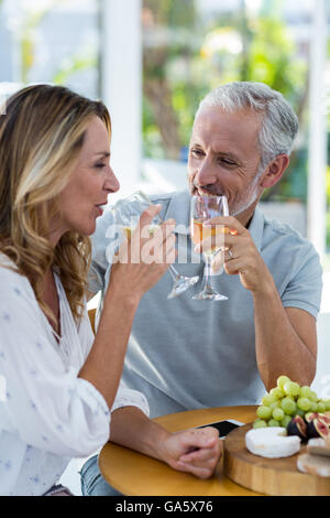 Mature couple drinking wine Stock Photo