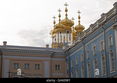 Golden domes of the Catherine or Summer Palace, Tsarskoe Selo, Pushkin, St Petersburg, Russia. Russian gold leaf gilt crosses fi Stock Photo