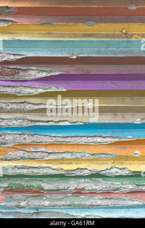 Old colorful painted wall as background Stock Photo